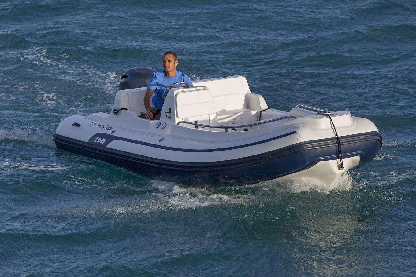 a man on a boat aboard PURA VIDA Yacht for Charter