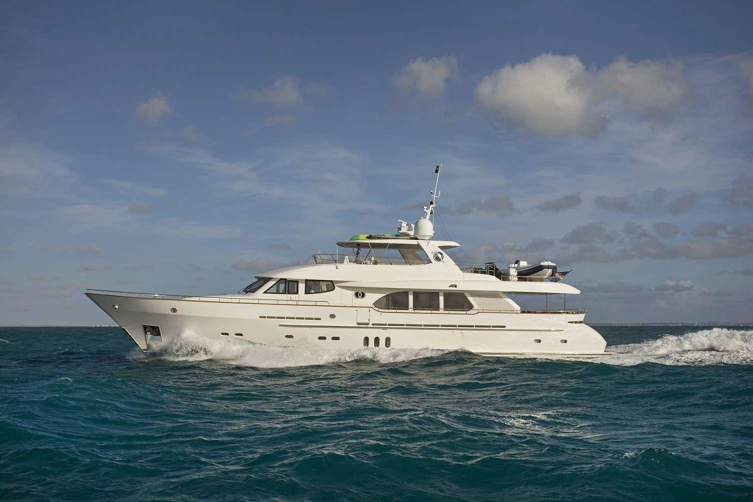 a white boat in the water aboard PURA VIDA Yacht for Charter