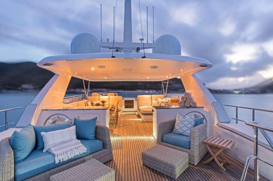 a boat on a deck aboard PURA VIDA Yacht for Charter