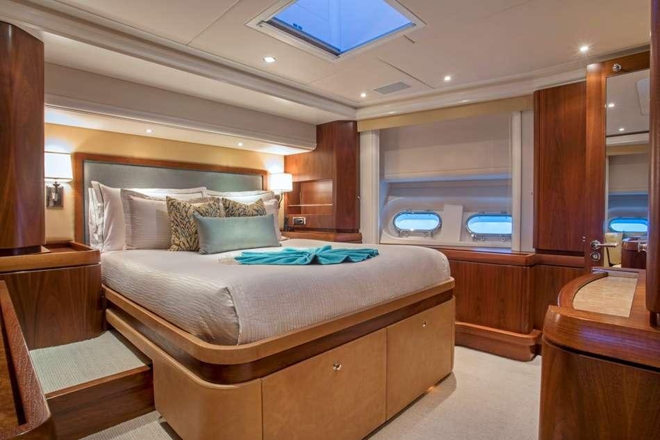 a bed in a room aboard PURA VIDA Yacht for Charter