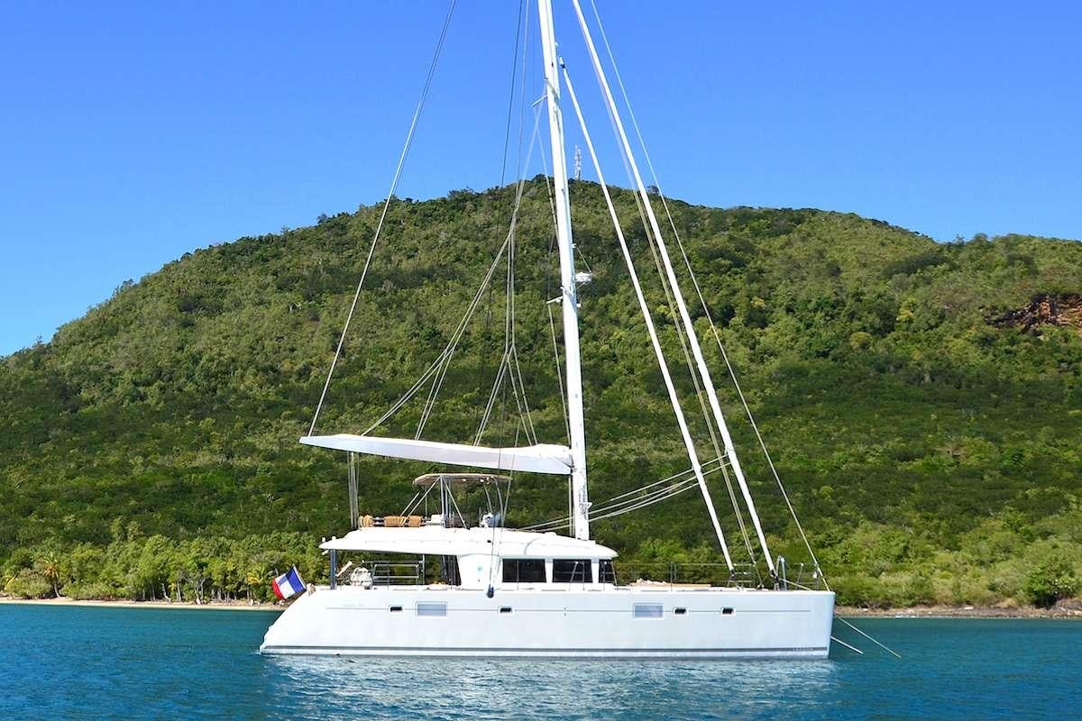 a white boat on the water aboard BACCHUS Yacht for Charter