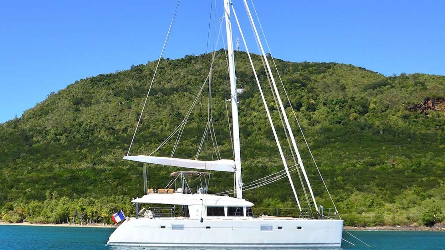 a white boat on the water aboard BACCHUS Yacht for Charter