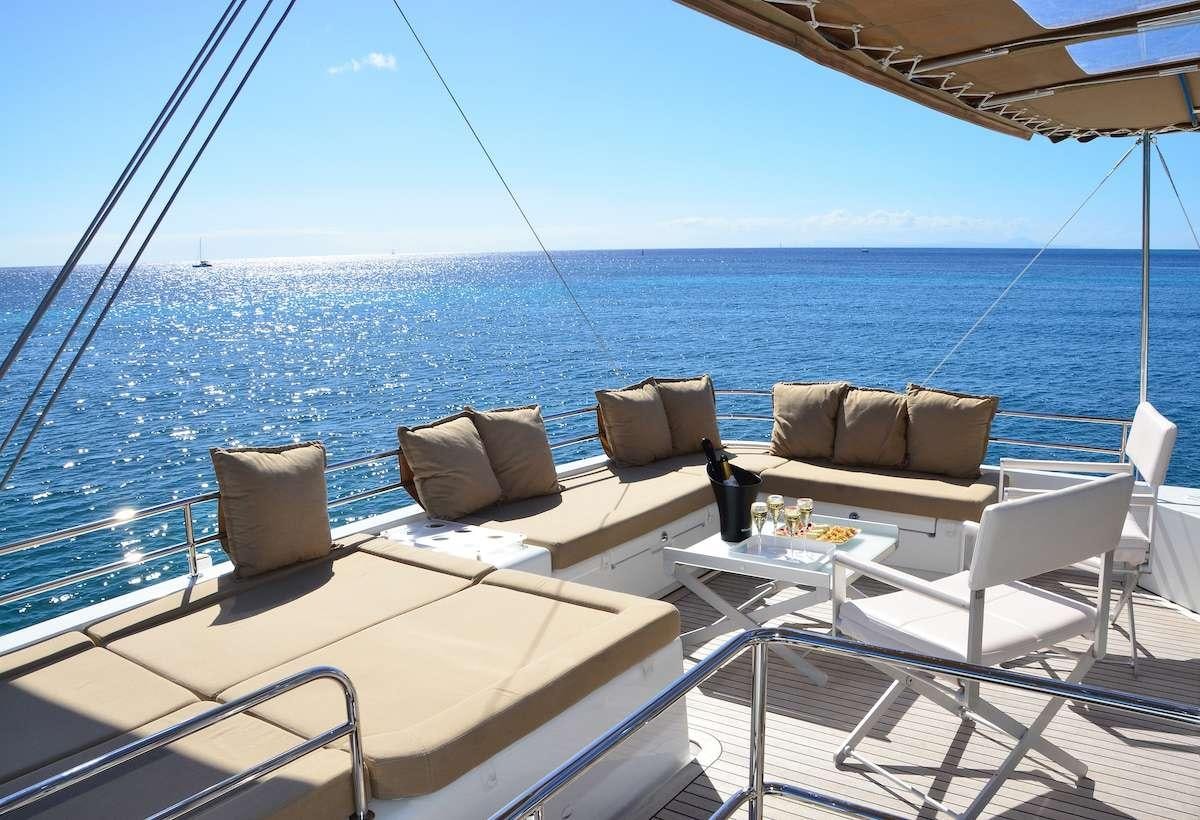 a lounge area on a boat aboard BACCHUS Yacht for Charter
