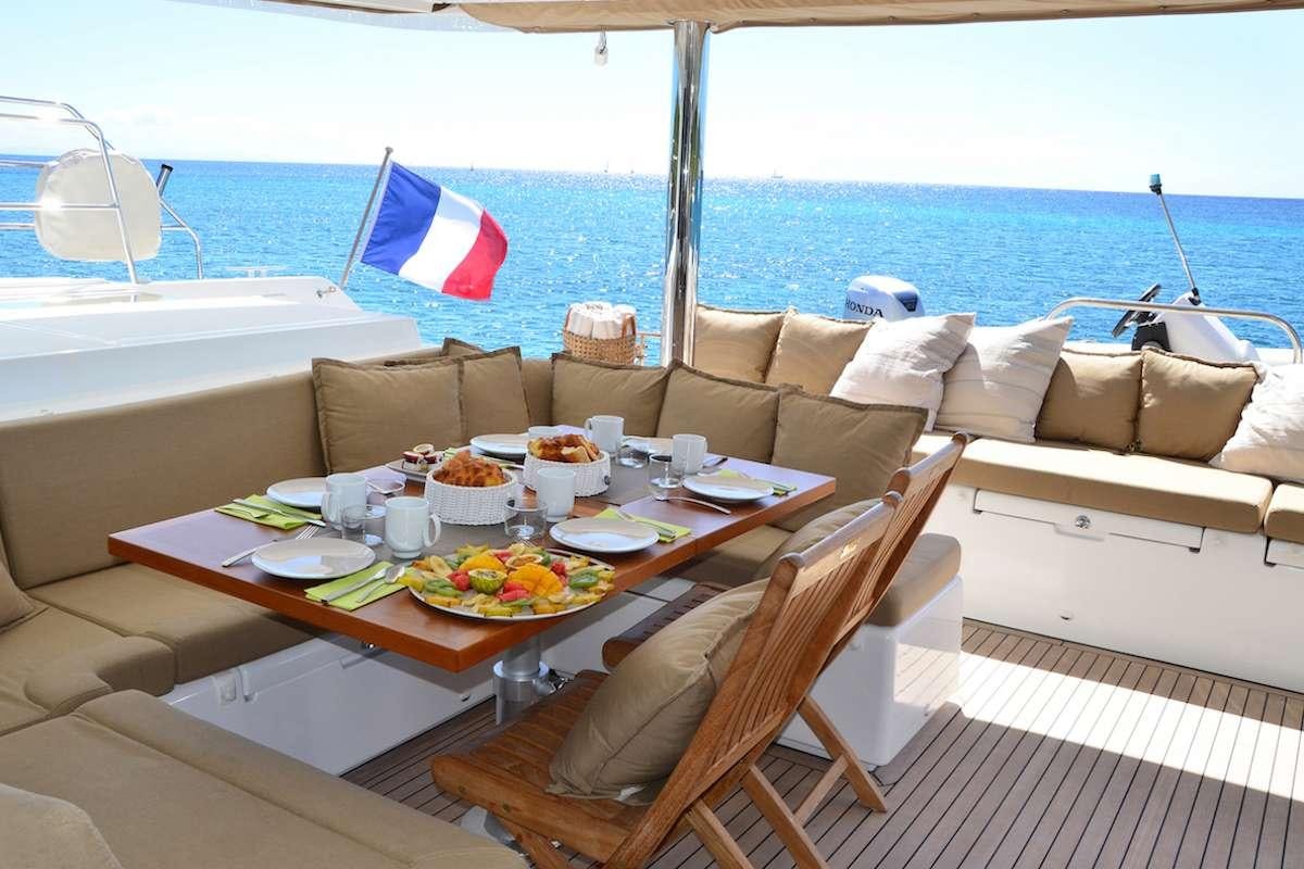 a table with food on it aboard BACCHUS Yacht for Charter