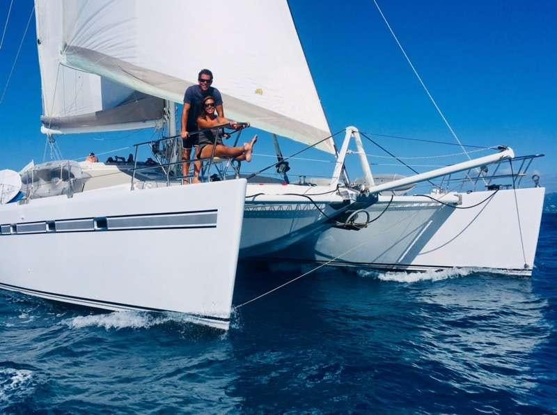 two men on a white boat aboard KELEA Yacht for Charter