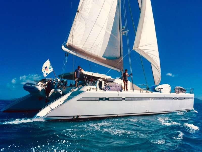 a group of people on a sailboat aboard KELEA Yacht for Charter