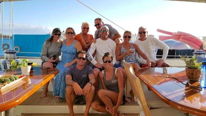 a group of people on a boat aboard KELEA Yacht for Charter