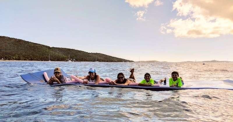 a group of people on a boat aboard KELEA Yacht for Charter