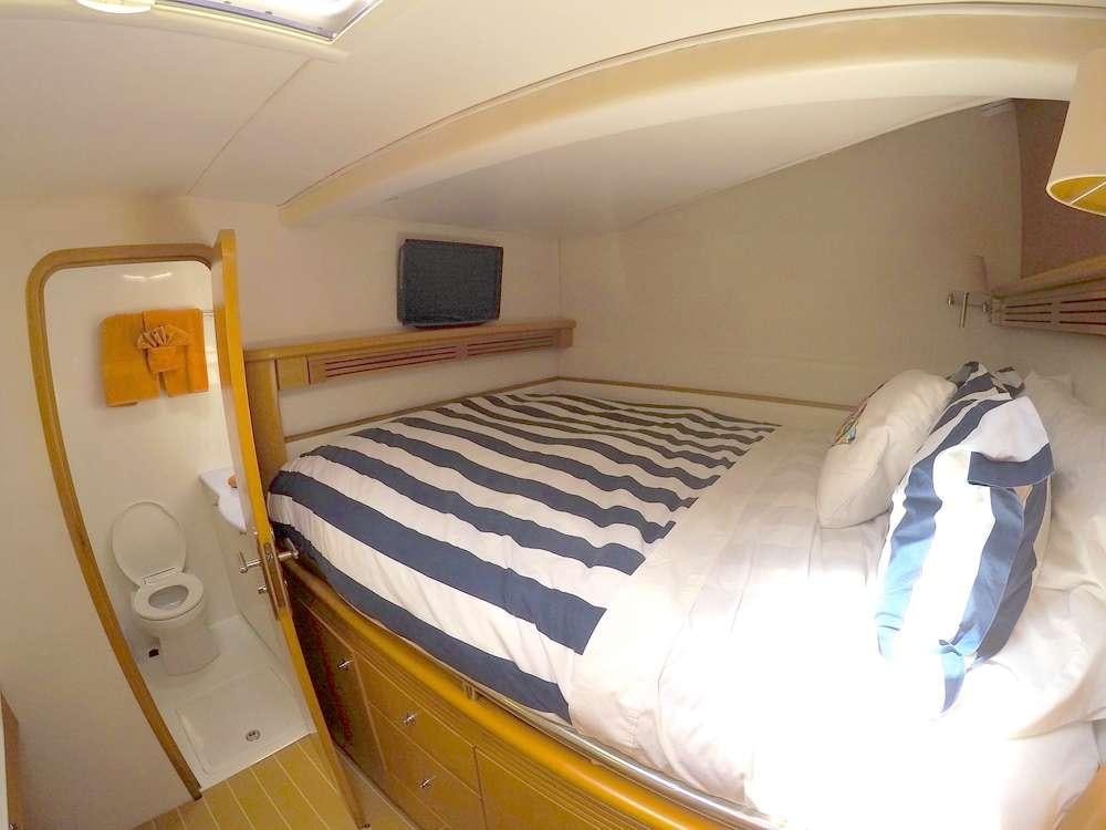 a small room with a bunk bed aboard KELEA Yacht for Charter