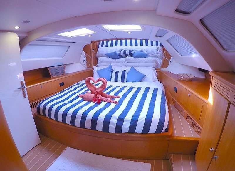 a couple of beds in a room aboard KELEA Yacht for Charter