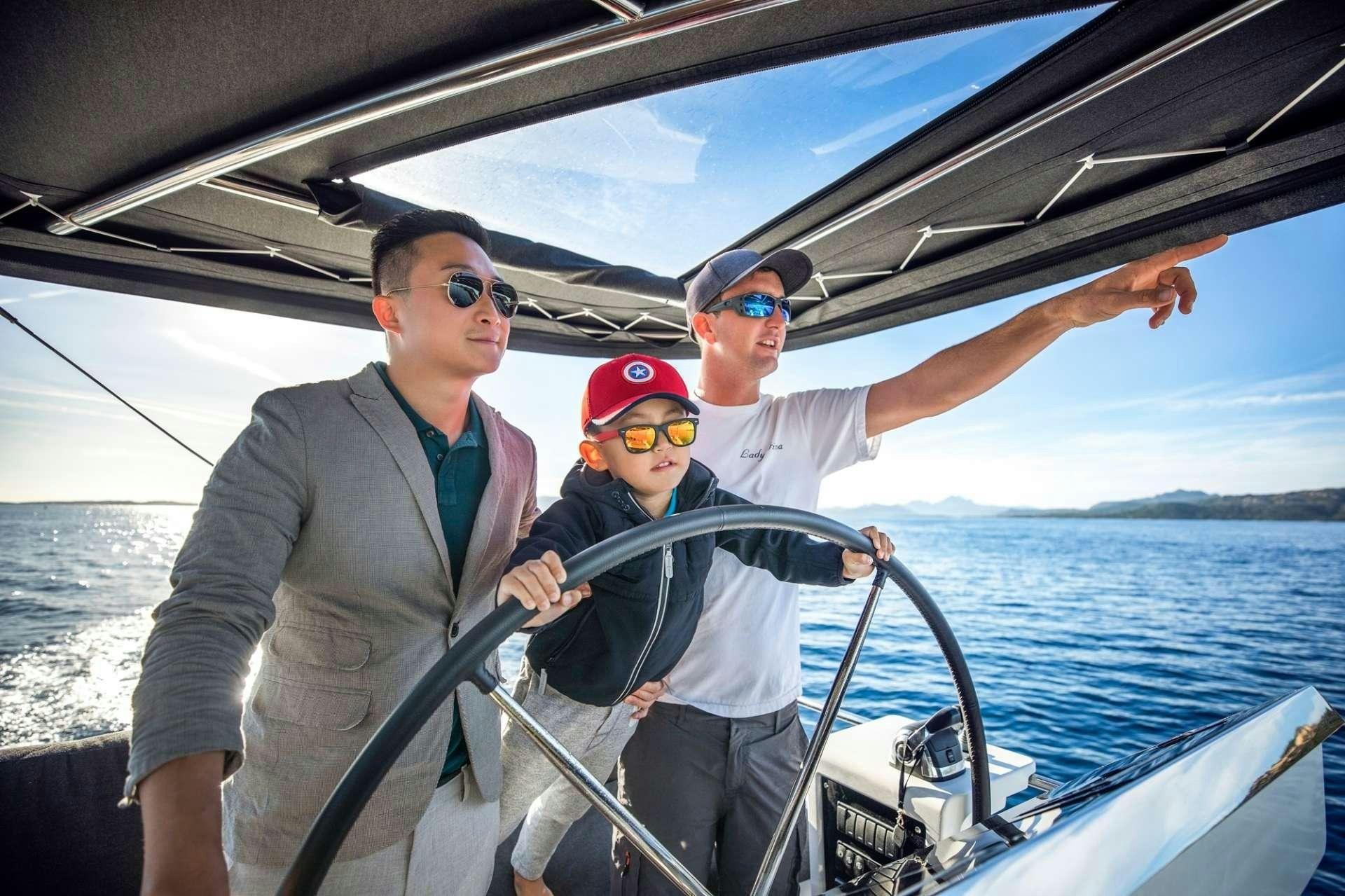 a group of men on a boat aboard LADY FIONA Yacht for Charter