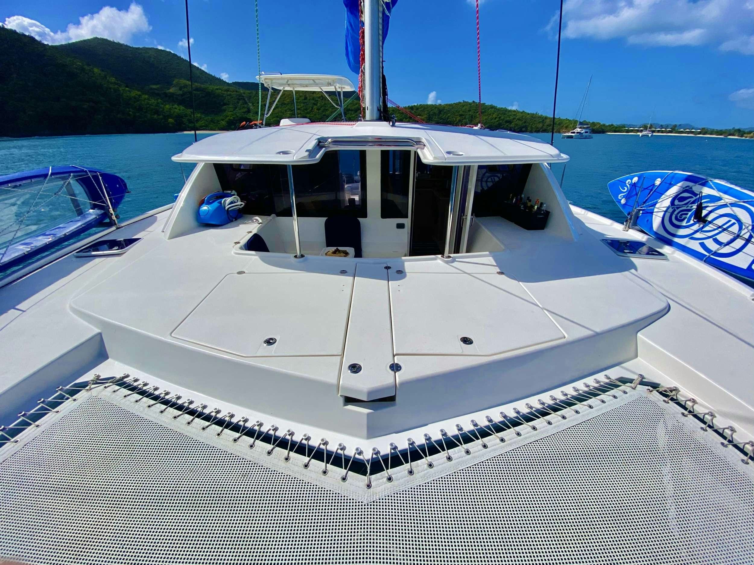 a boat on the water aboard LET'S PLAY TWO Yacht for Charter