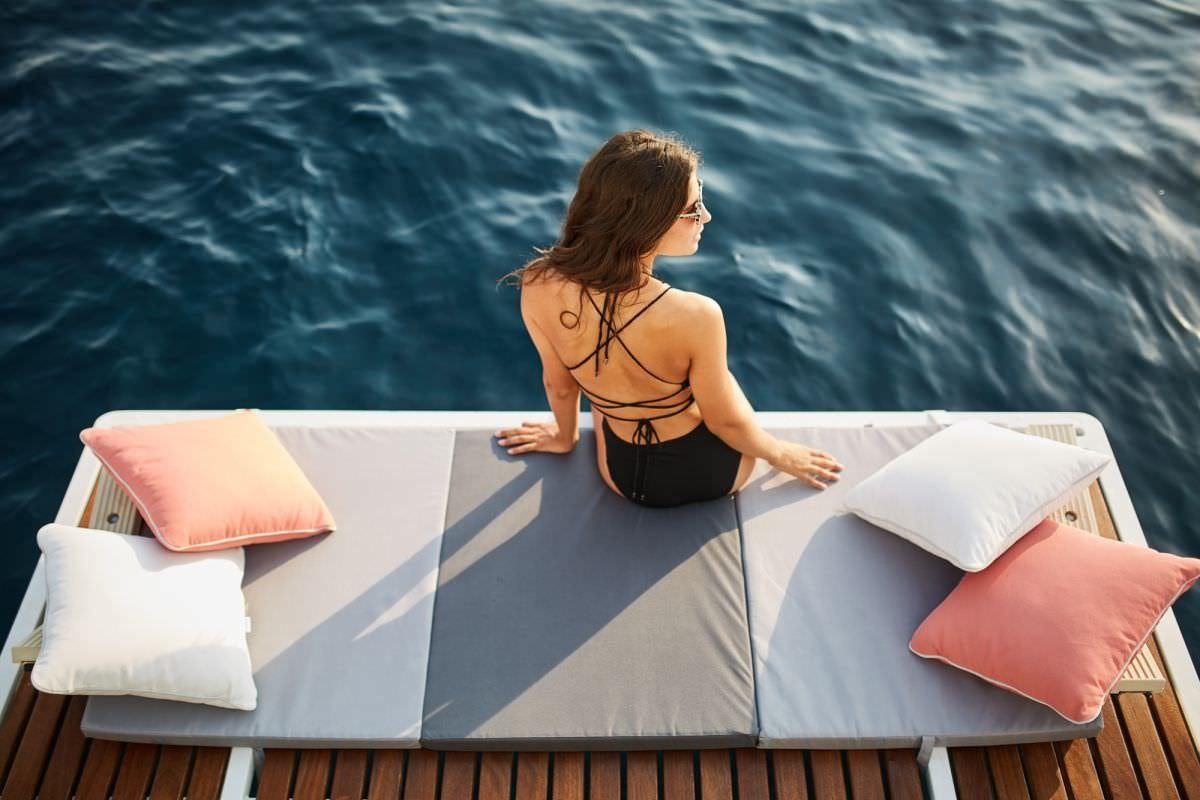 a person sitting on a boat aboard SANTA ANA Yacht for Charter