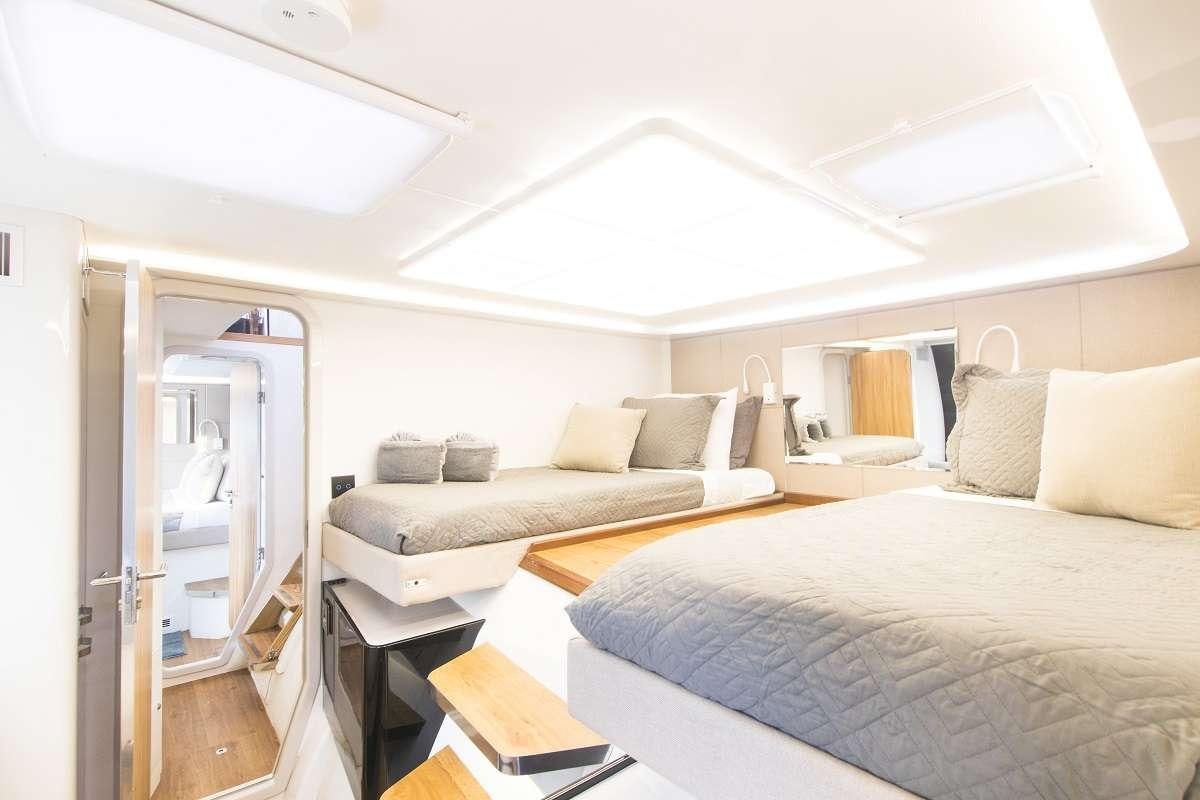 a room with two beds aboard SANTA ANA Yacht for Charter