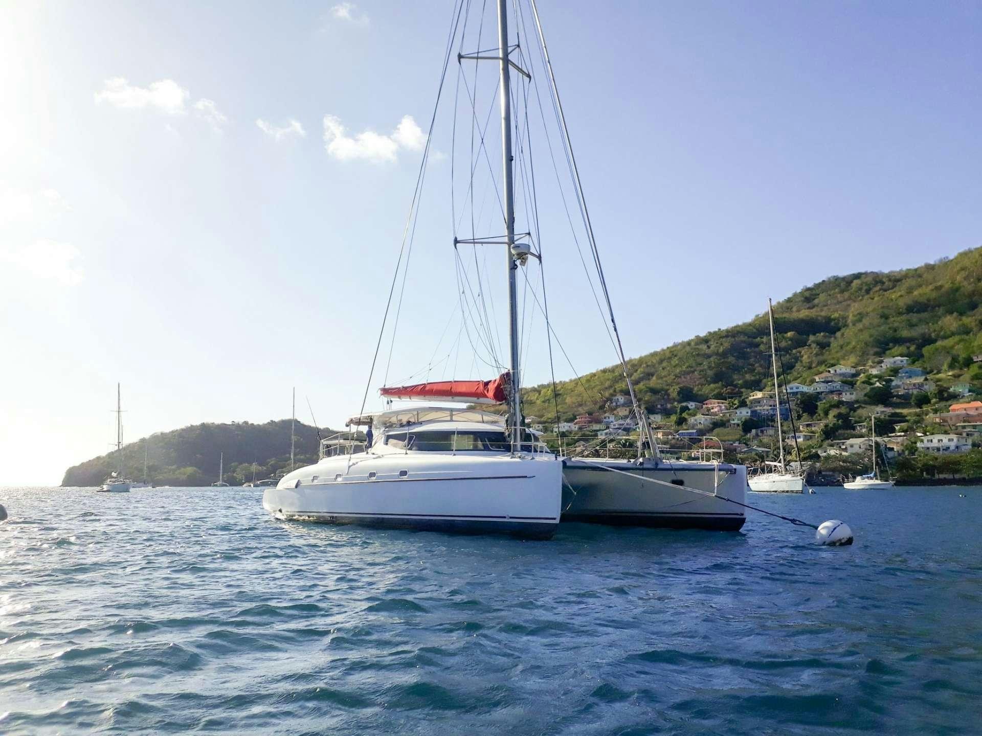 a group of boats in the water aboard Cataja Yacht for Charter