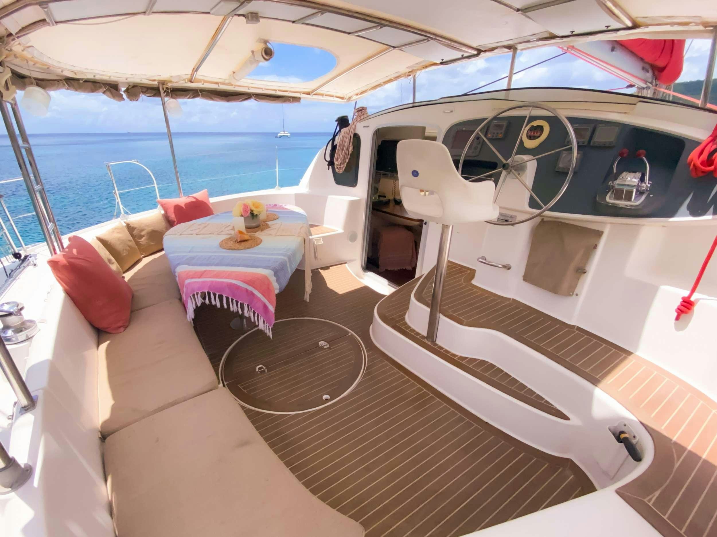 a boat on a deck aboard Cataja Yacht for Charter