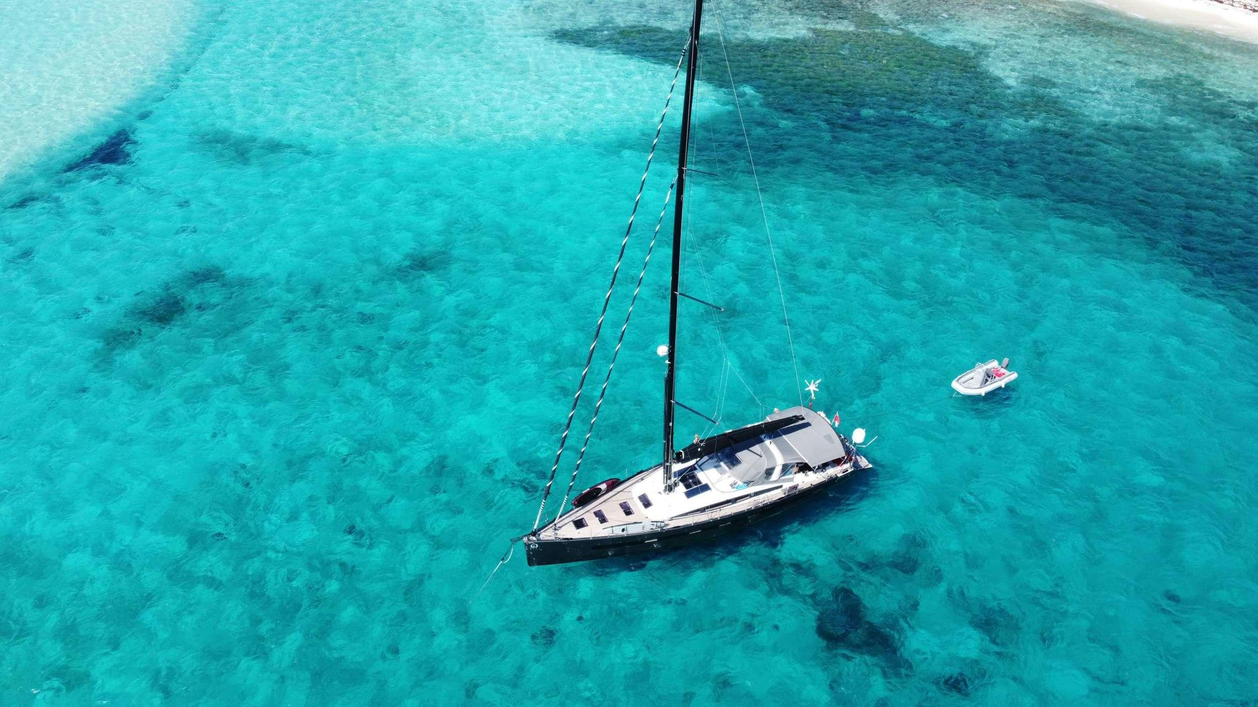 a boat sailing in the sea aboard BODHISATTVA (Caribbean) Yacht for Charter