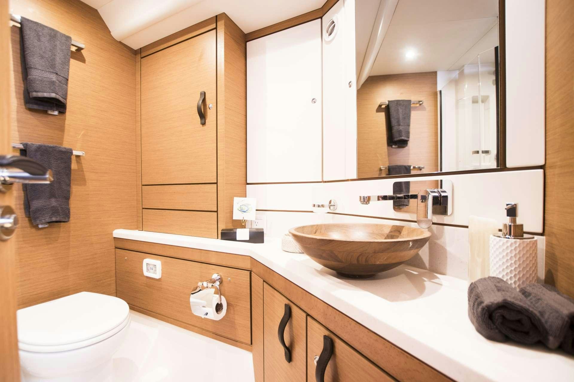 a bathroom with a sink and toilet aboard BODHISATTVA (Caribbean) Yacht for Charter