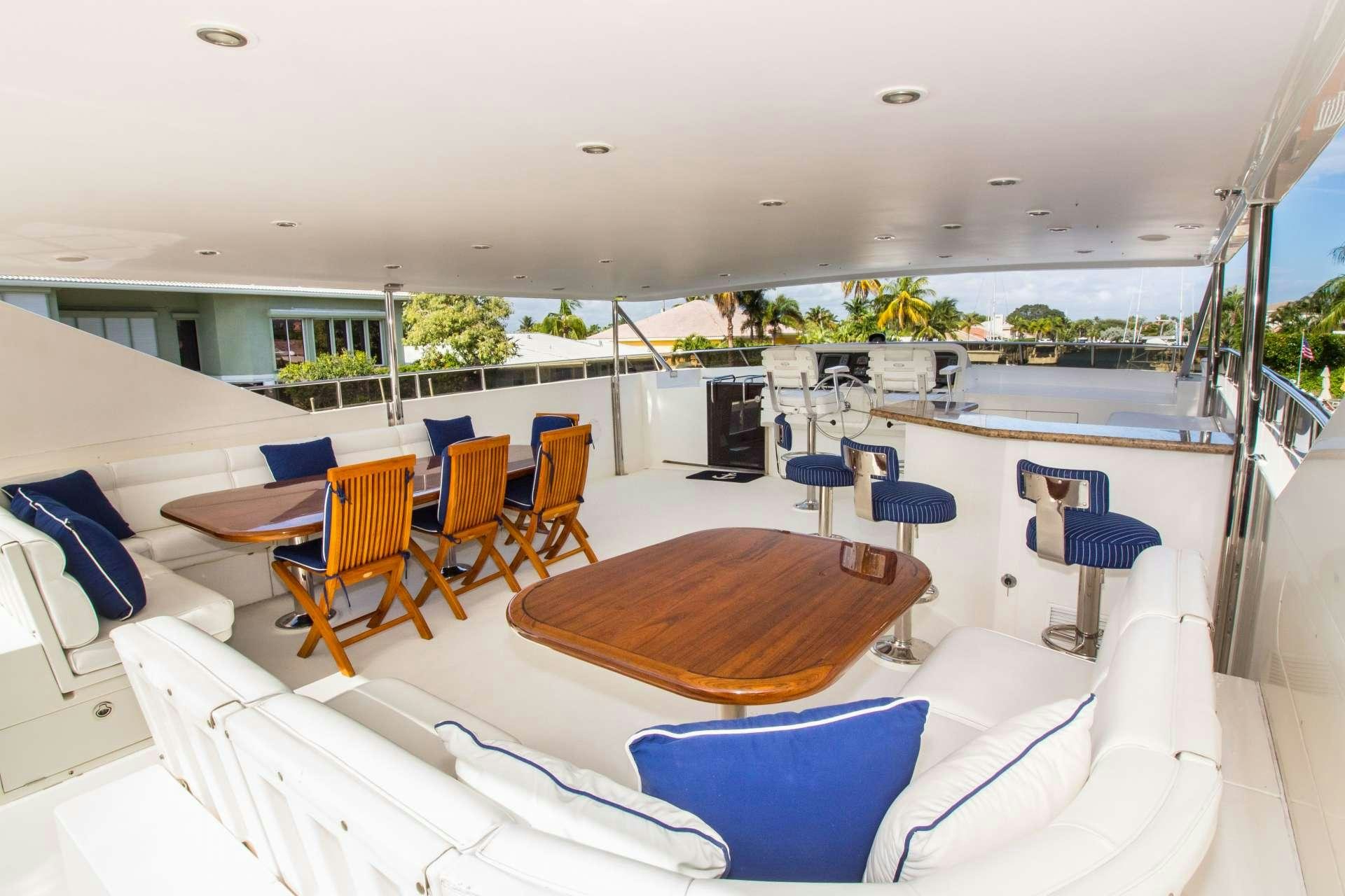 a room with a table and chairs aboard SANCTUARY Yacht for Charter