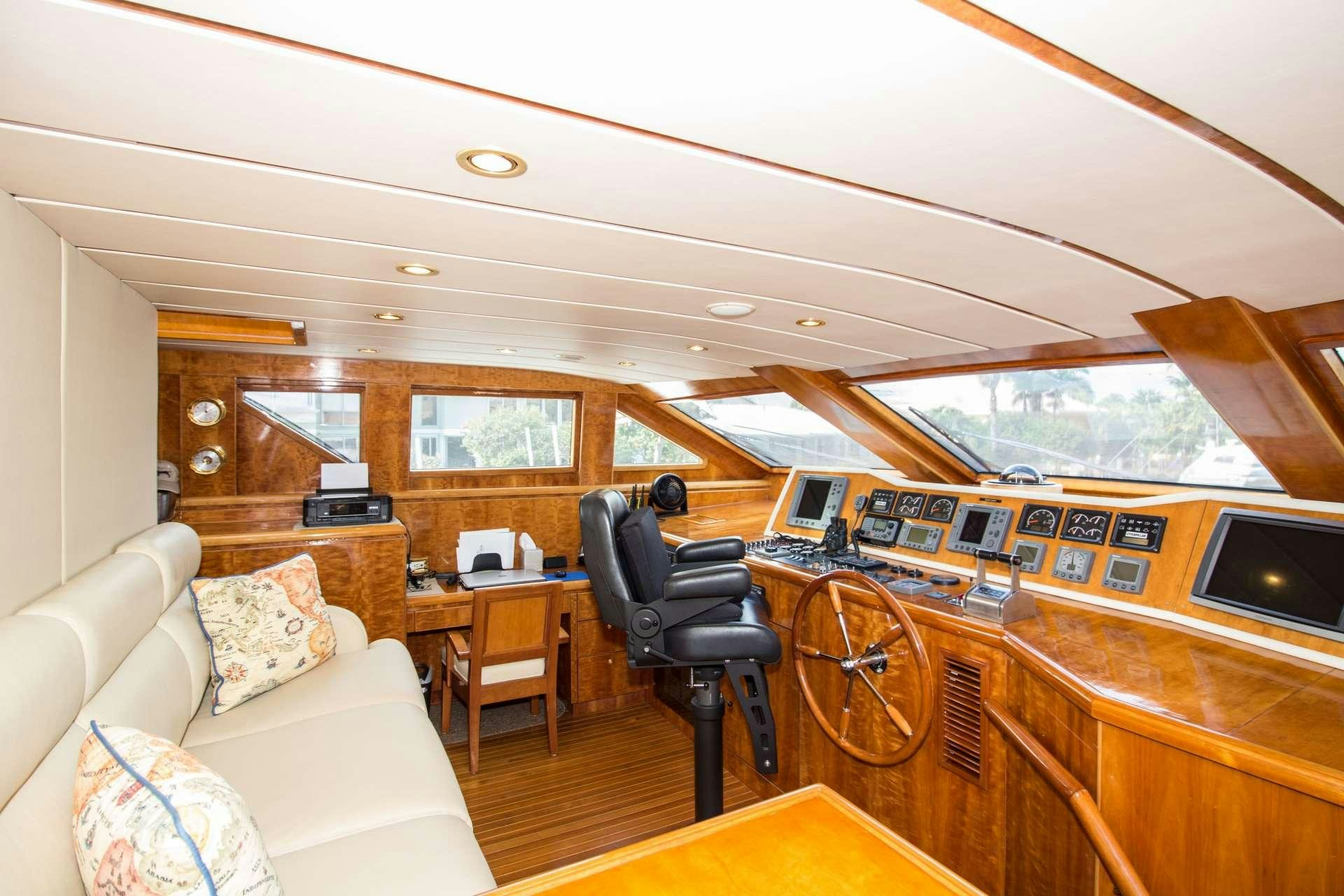 a room with a couch and a table and chairs aboard SANCTUARY Yacht for Charter