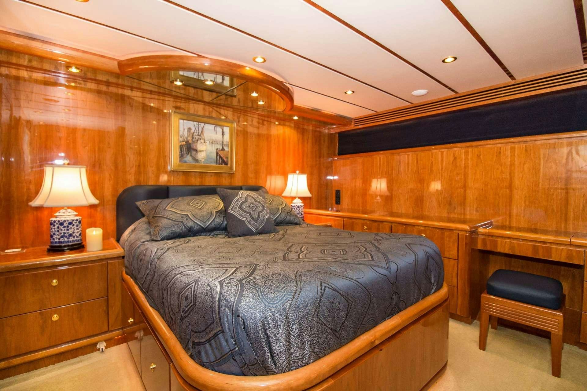 a bed in a room aboard SANCTUARY Yacht for Charter