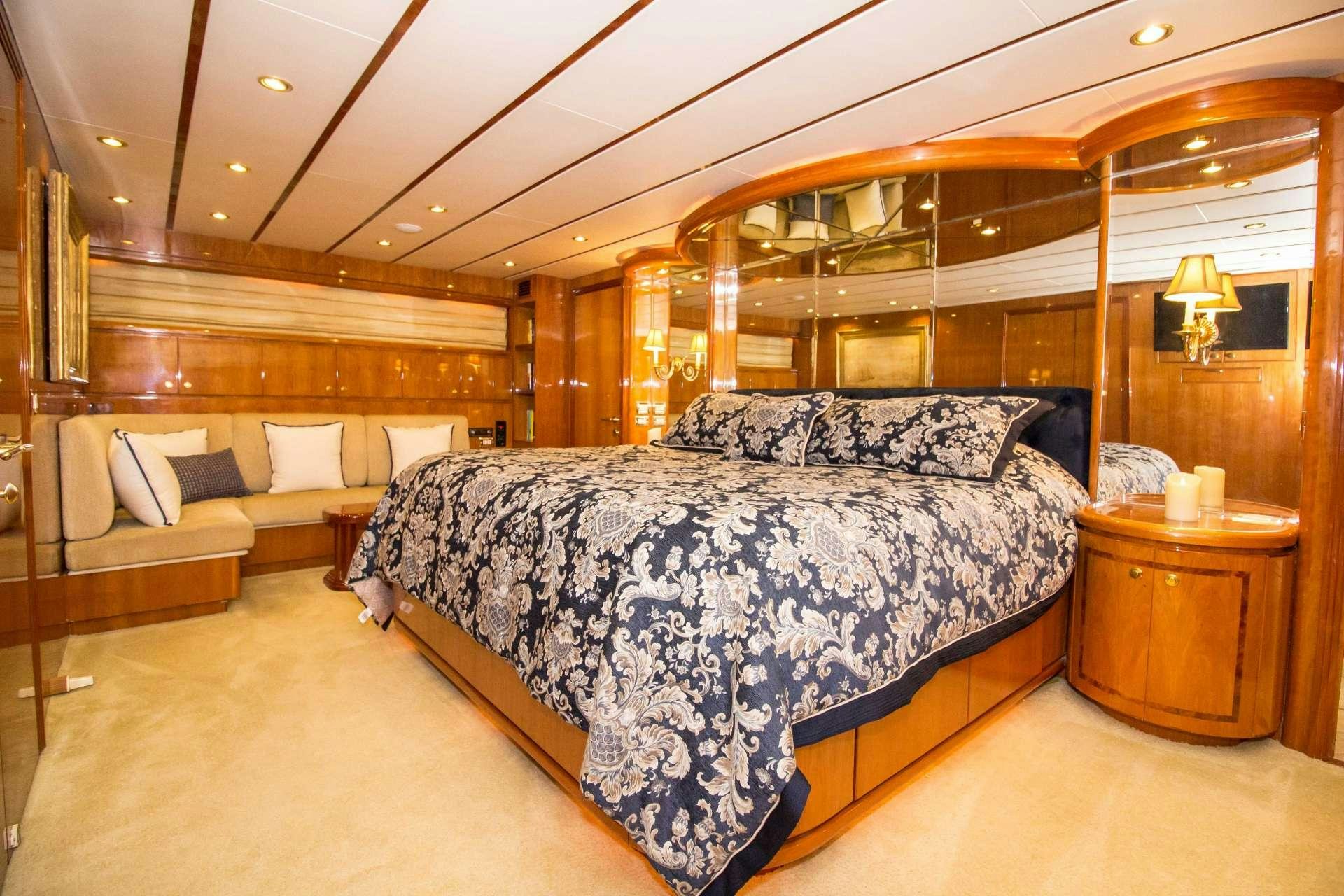 a large bed in a room aboard SANCTUARY Yacht for Charter