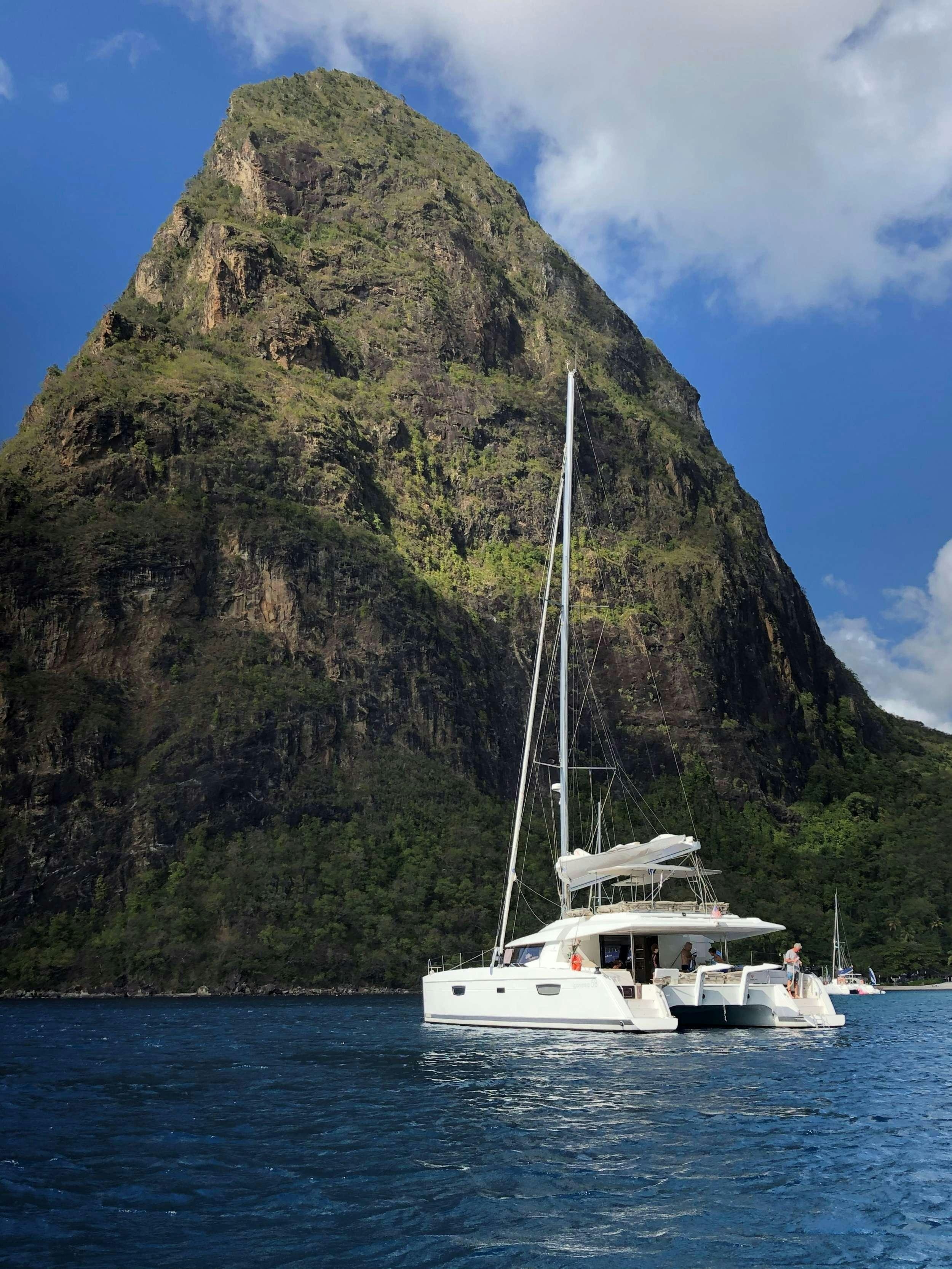 a boat sailing in the water aboard ENCHANTE Yacht for Charter