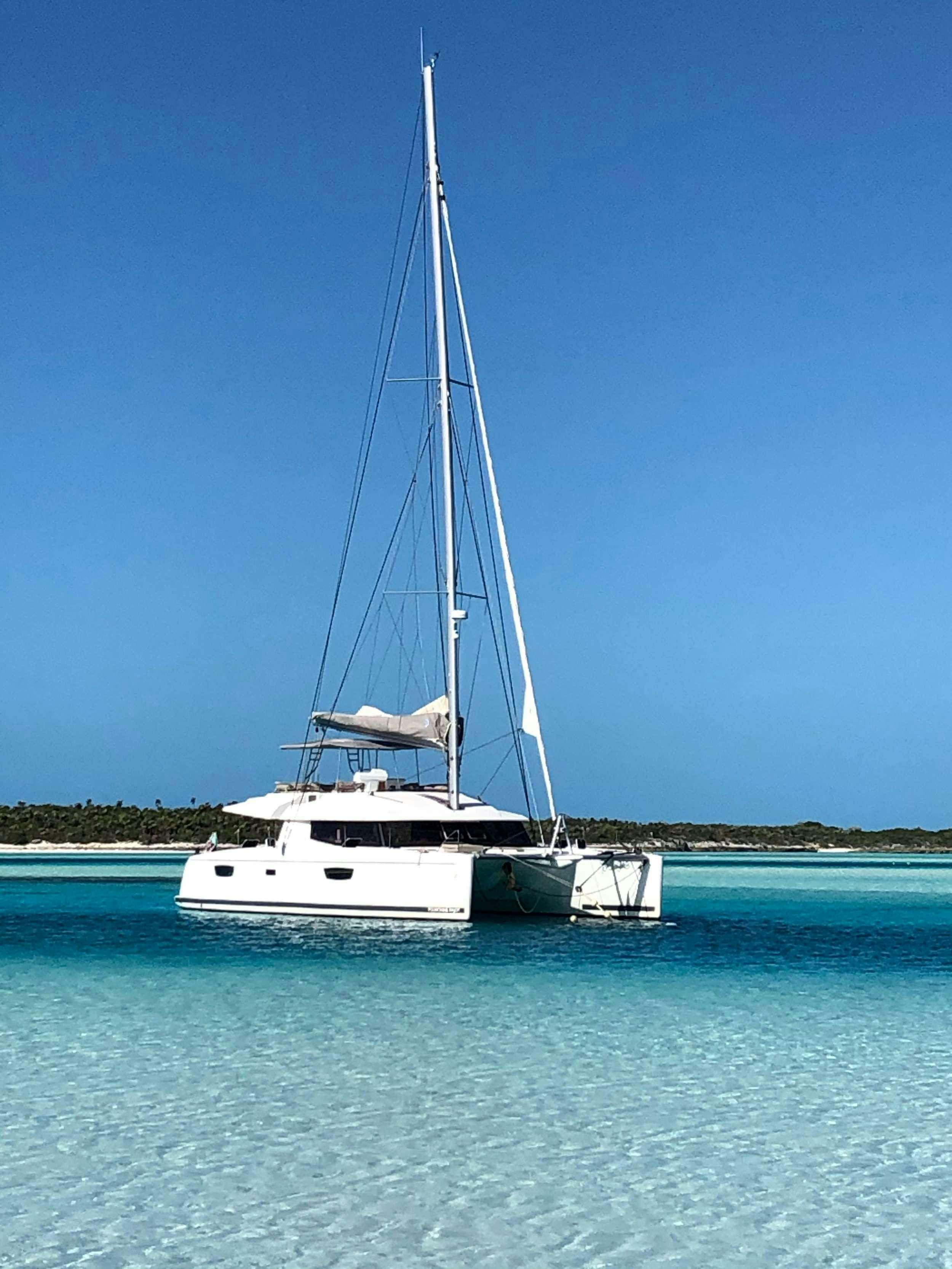 a sailboat on the water aboard ENCHANTE Yacht for Charter