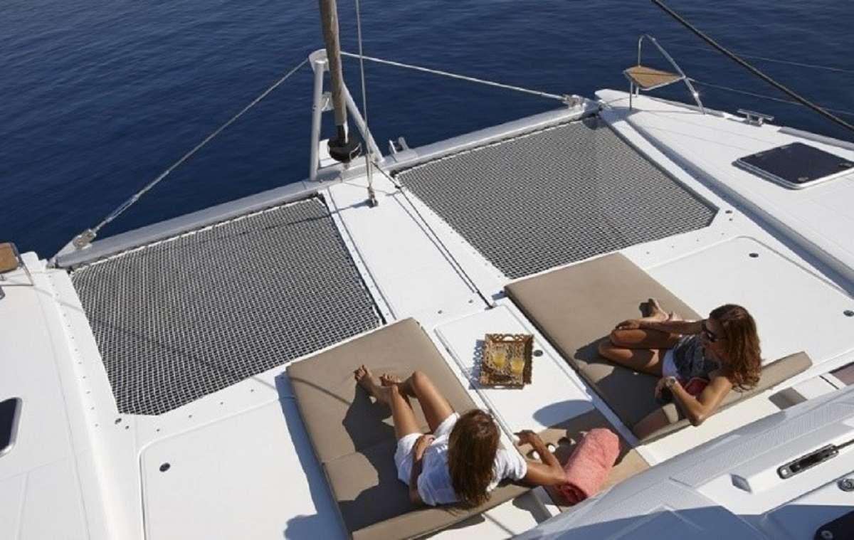 a person on a boat aboard ENCHANTE Yacht for Charter