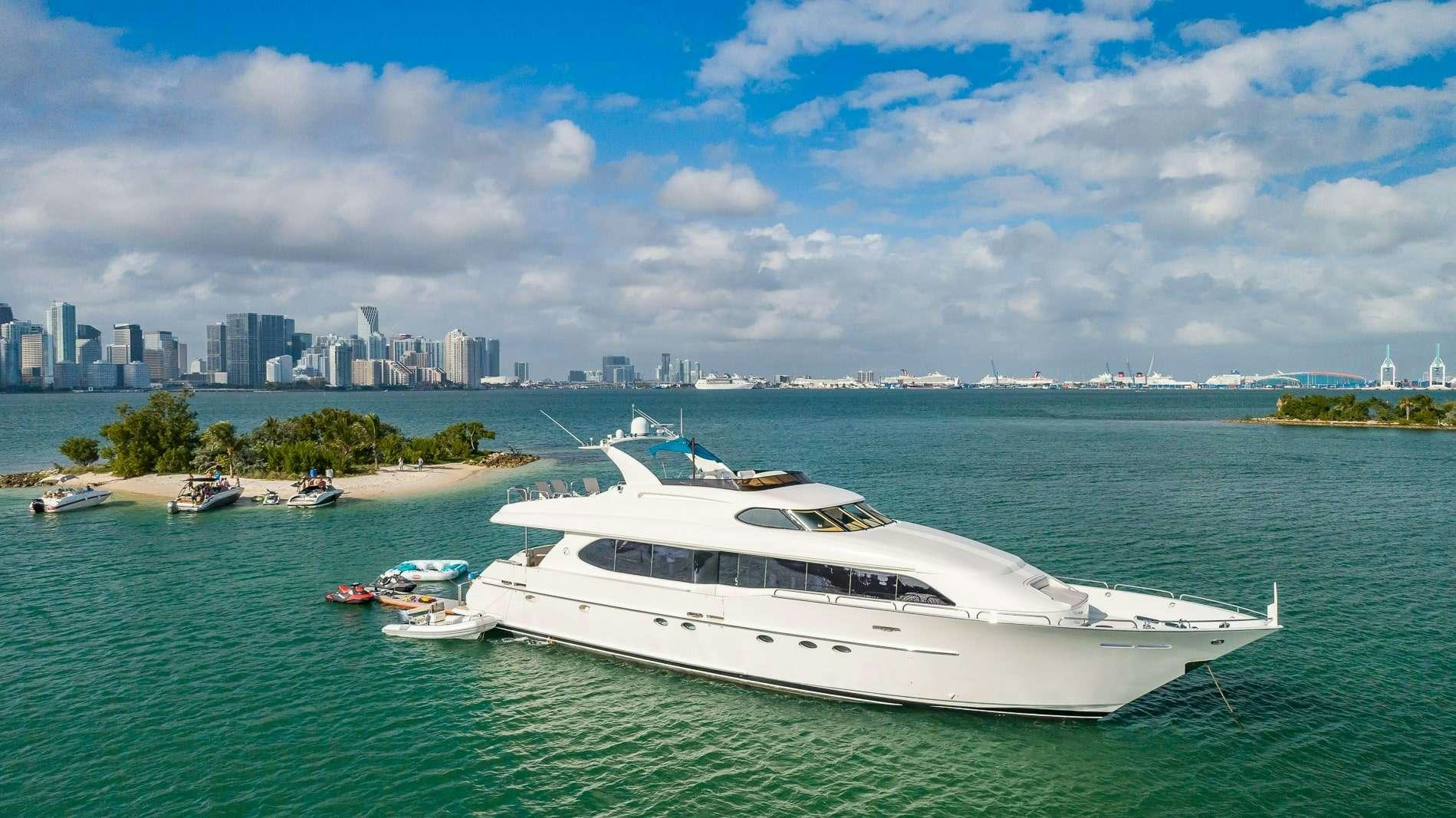 a white yacht in the water aboard IV TRANQUILITY Yacht for Charter