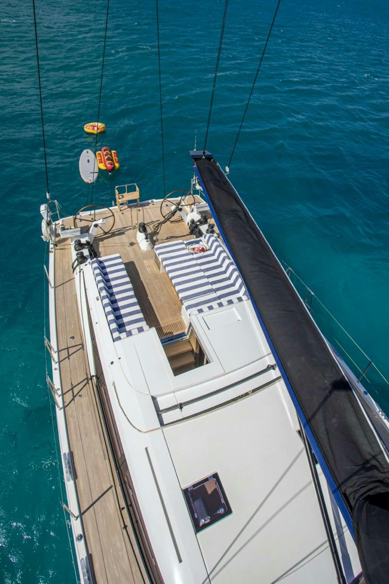 a large white boat in the water aboard CNB66 Yacht for Charter