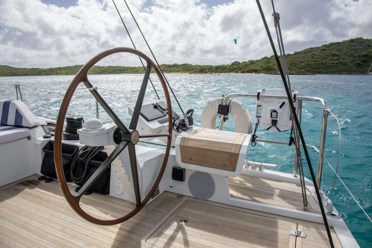 a boat on the water aboard CNB66 Yacht for Charter