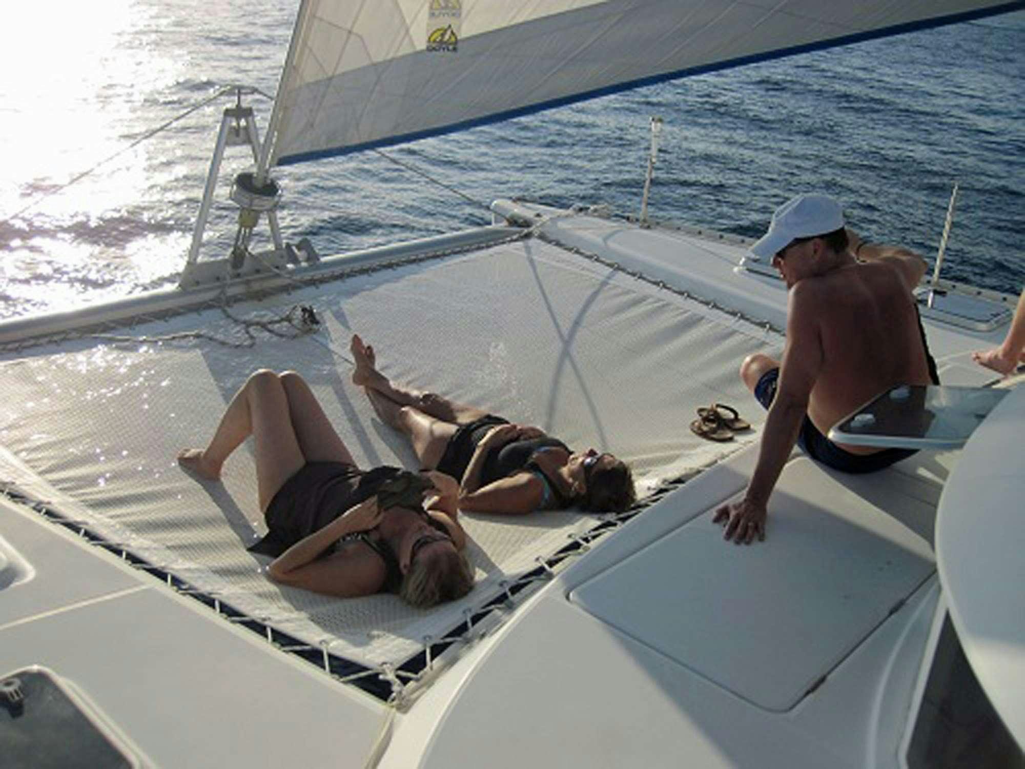 a group of people on a boat aboard GUIDING LIGHT Yacht for Charter