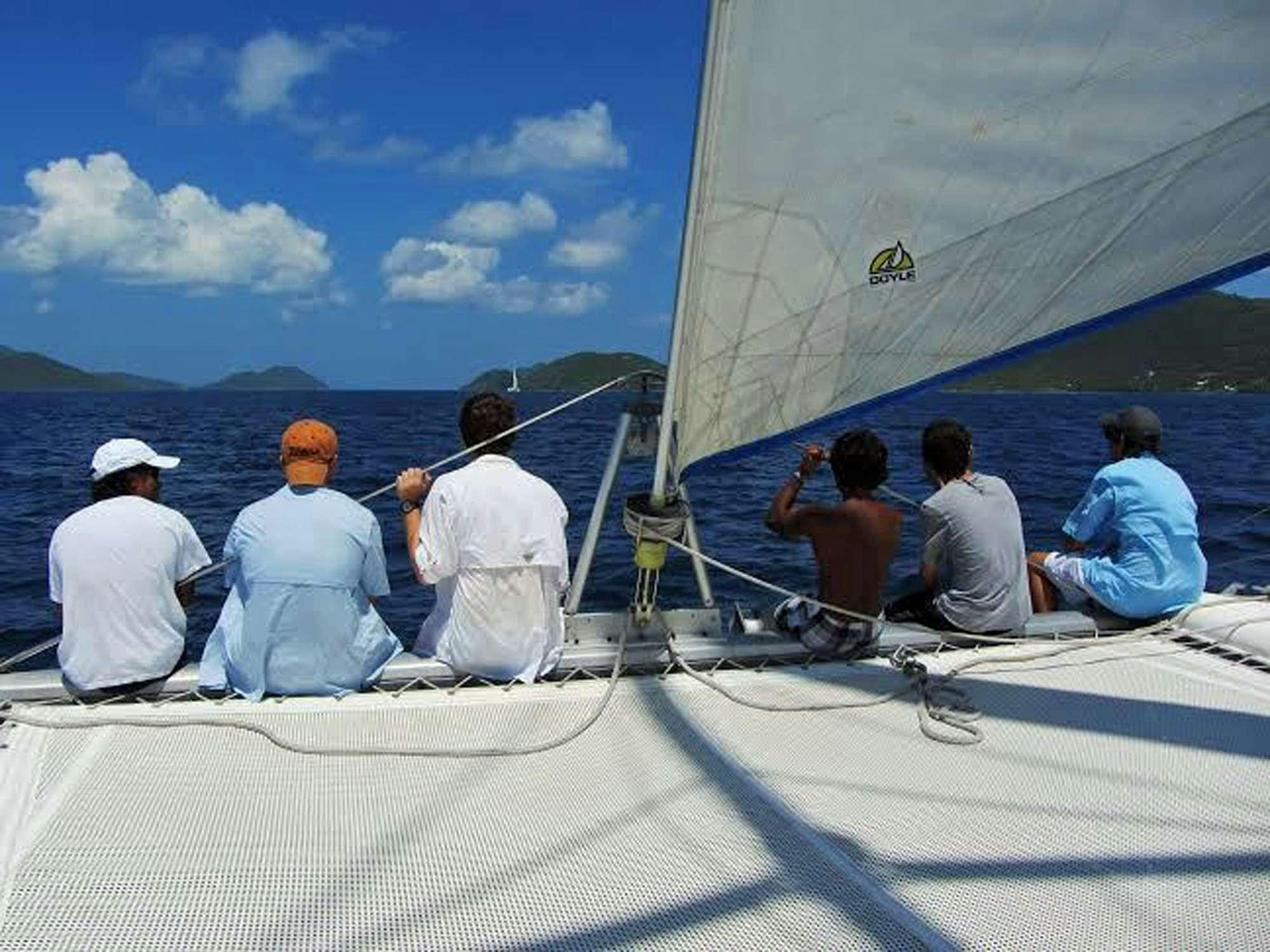 a group of people on a boat aboard GUIDING LIGHT Yacht for Charter