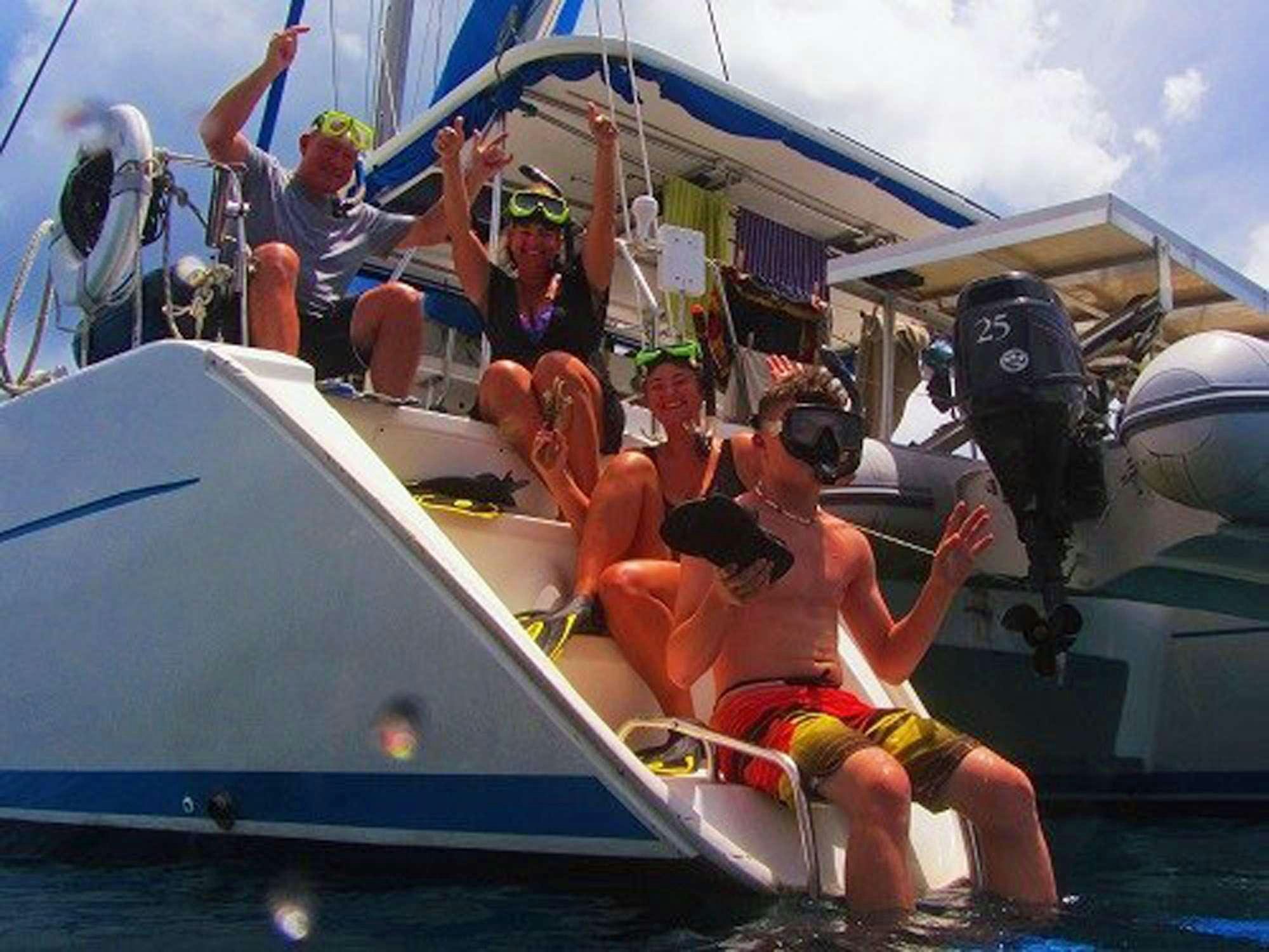 a group of people on a boat aboard GUIDING LIGHT Yacht for Charter