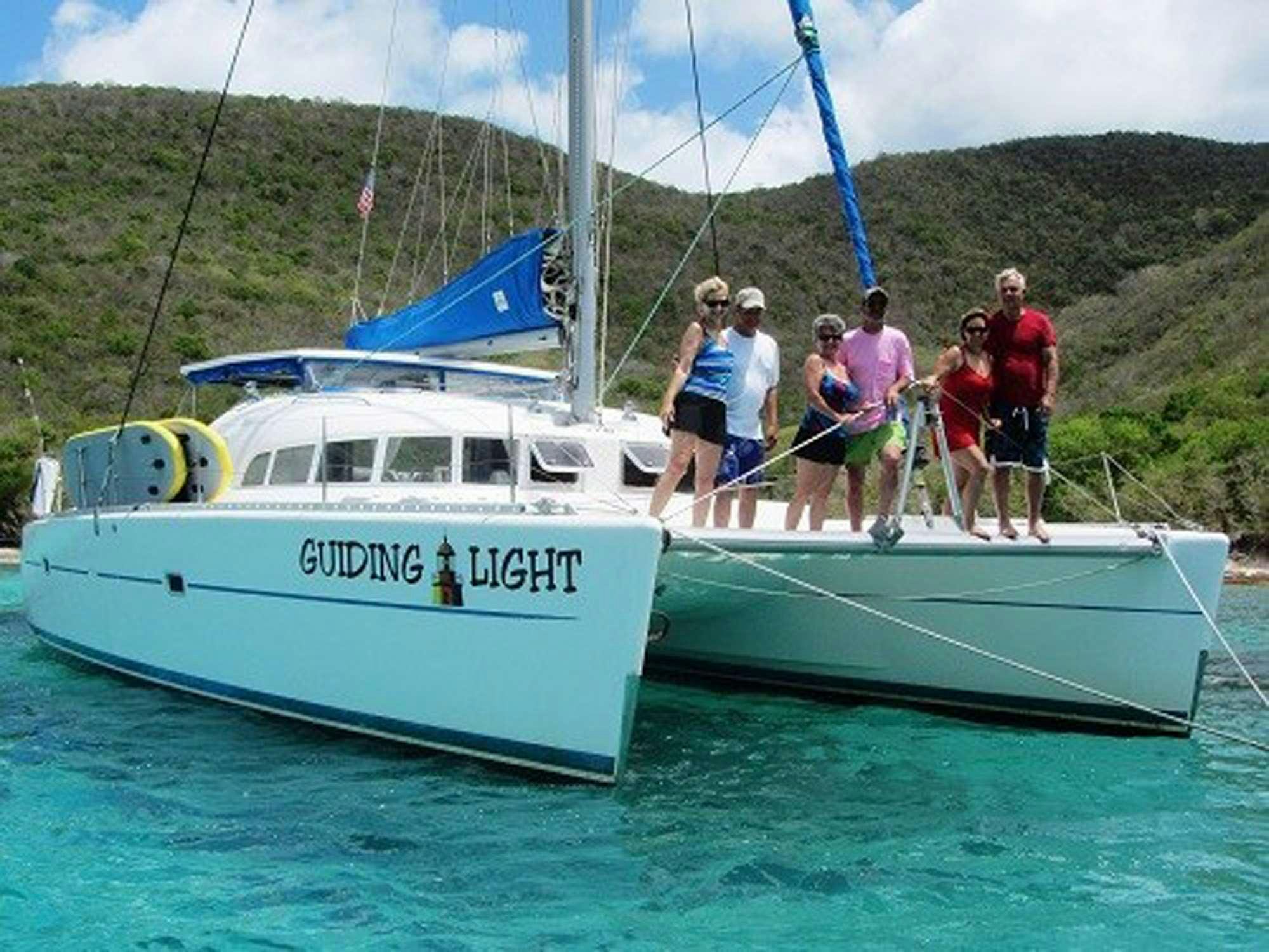 a group of people on a boat aboard GUIDING LIGHT Yacht for Charter