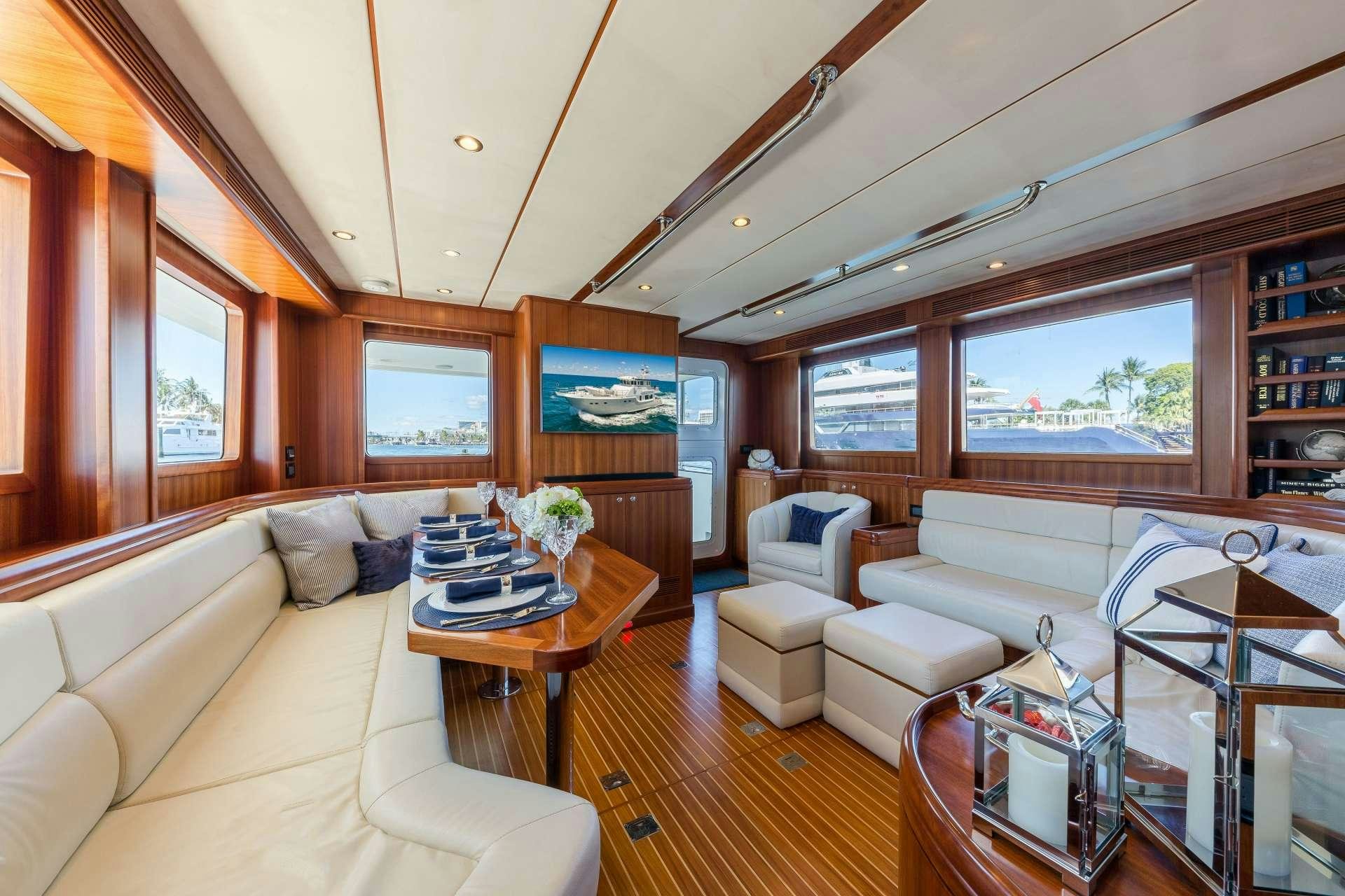 a living room with a large window aboard ASTURIAS Yacht for Charter