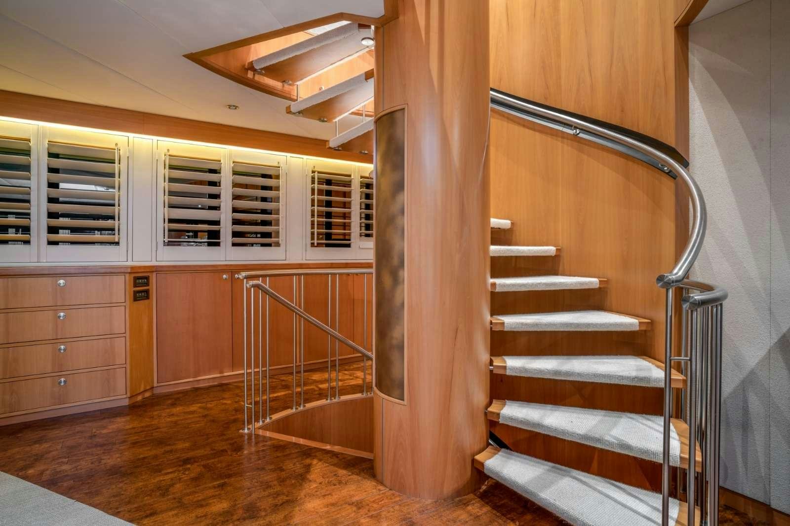 a staircase in a house aboard ENVY Yacht for Charter