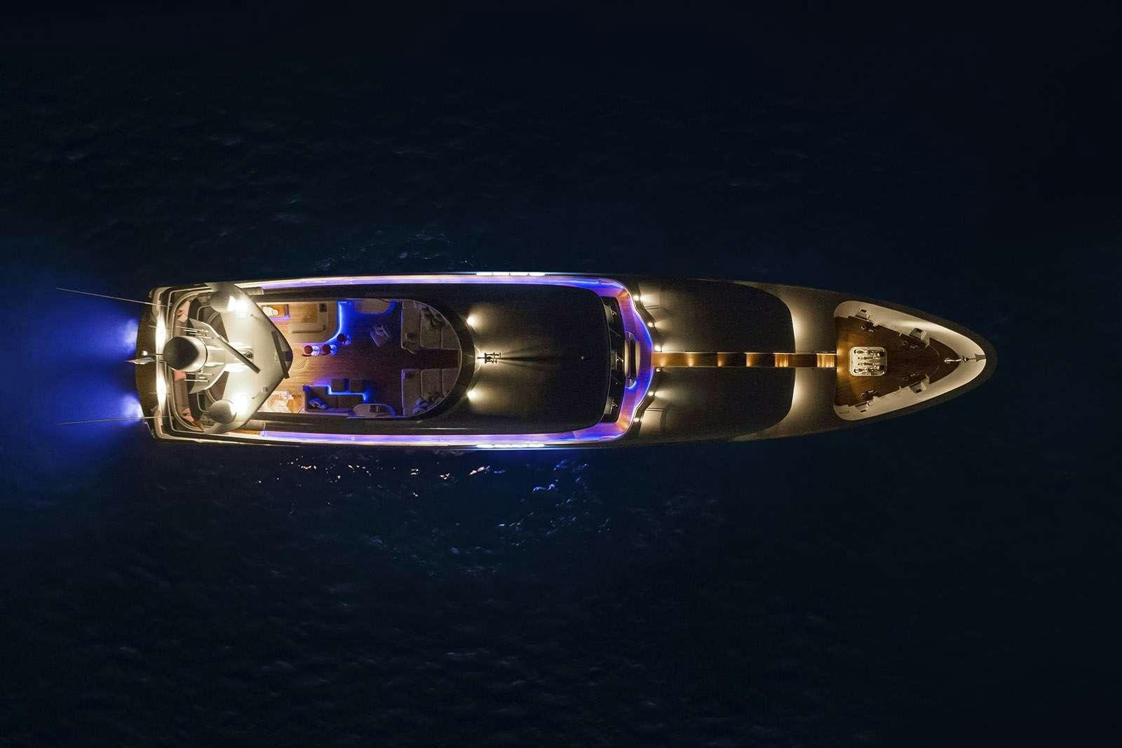 a silver and gold ring with a blue ring on it aboard ENVY Yacht for Charter