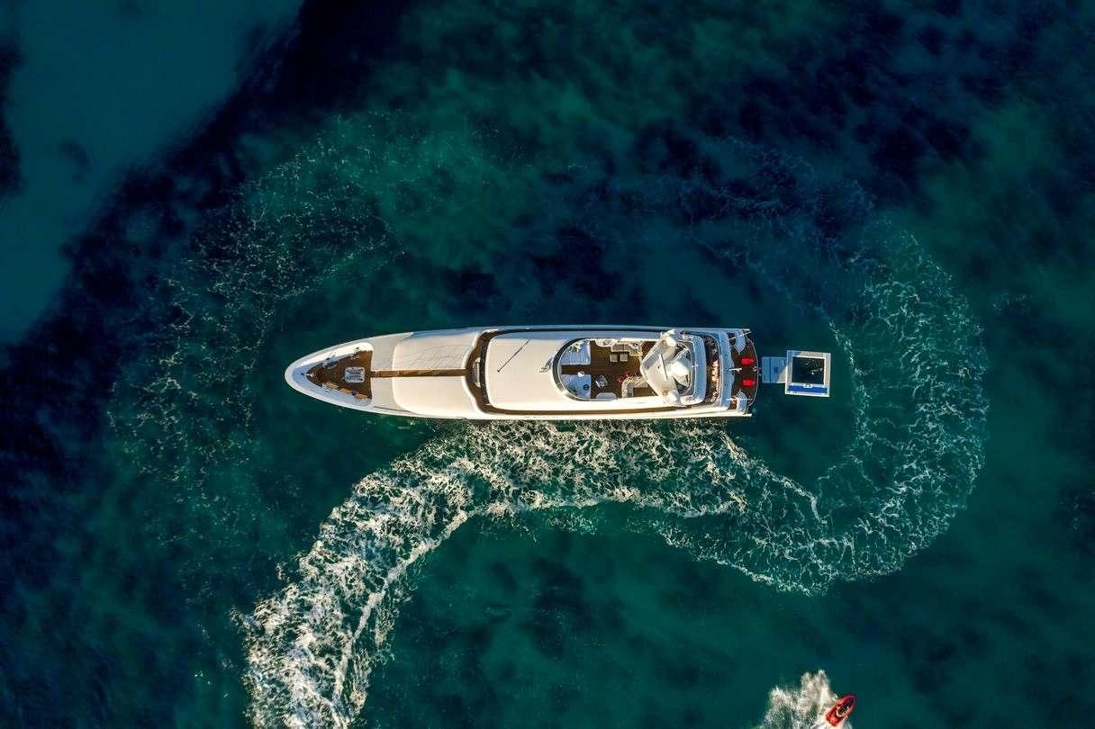a person in a boat aboard ENVY Yacht for Charter