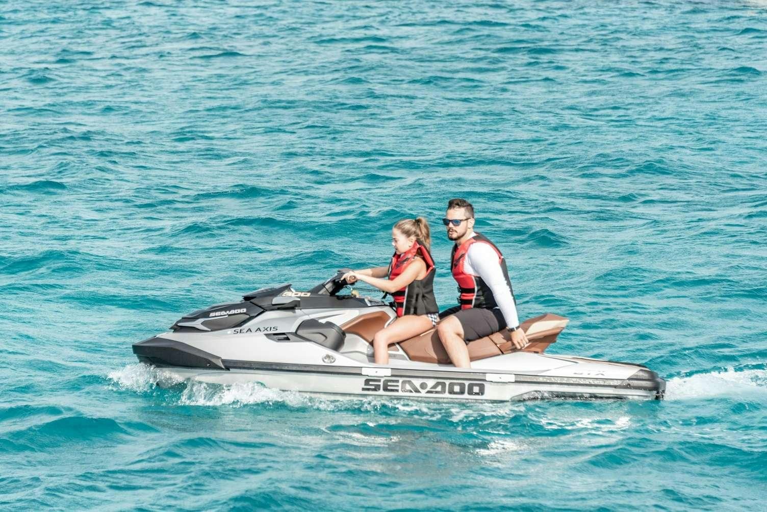 a group of people on a boat aboard SEA AXIS Yacht for Charter