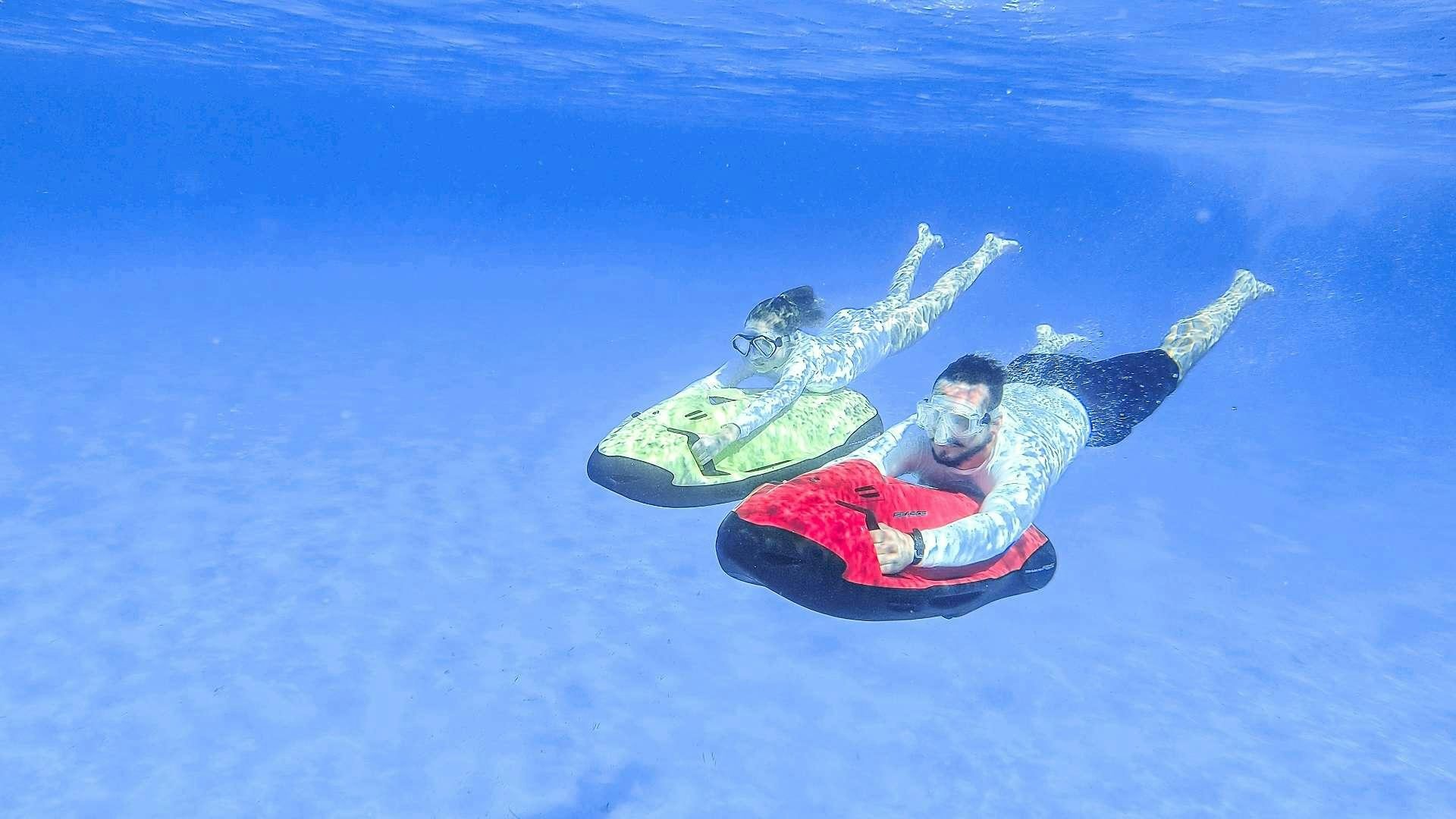 a man in a red and white costume in the snow aboard SEA AXIS Yacht for Charter