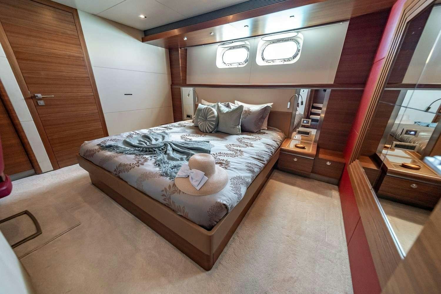 a bed in a room aboard SEA AXIS Yacht for Charter