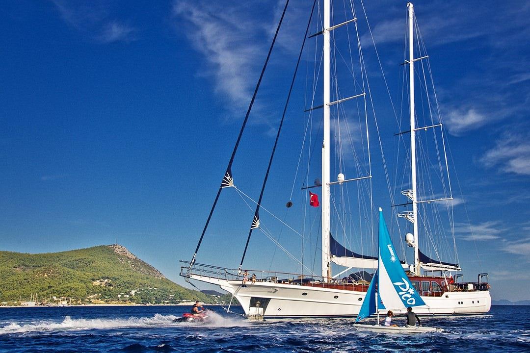 a boat sailing on the water aboard CLEAR EYES Yacht for Charter