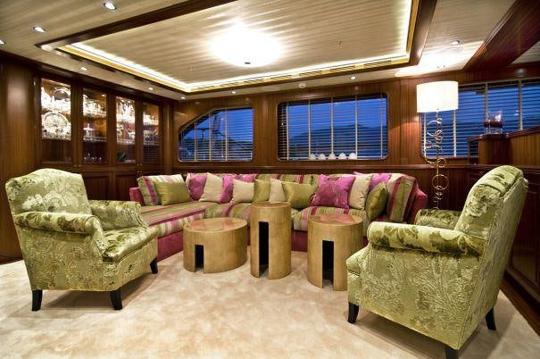 a living room with couches and a table aboard CLEAR EYES Yacht for Charter