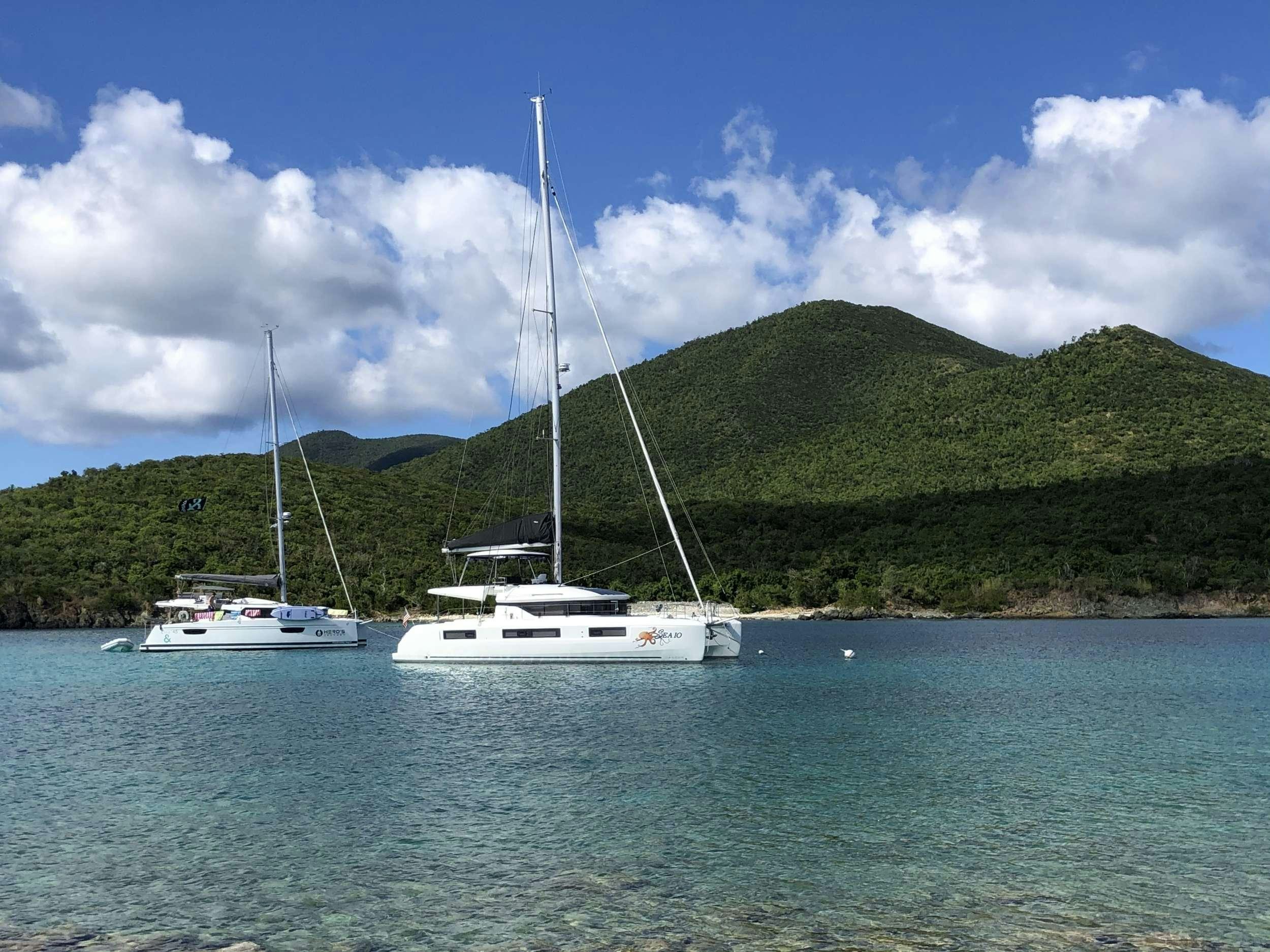 a couple of boats in the water aboard SEA IO Yacht for Charter