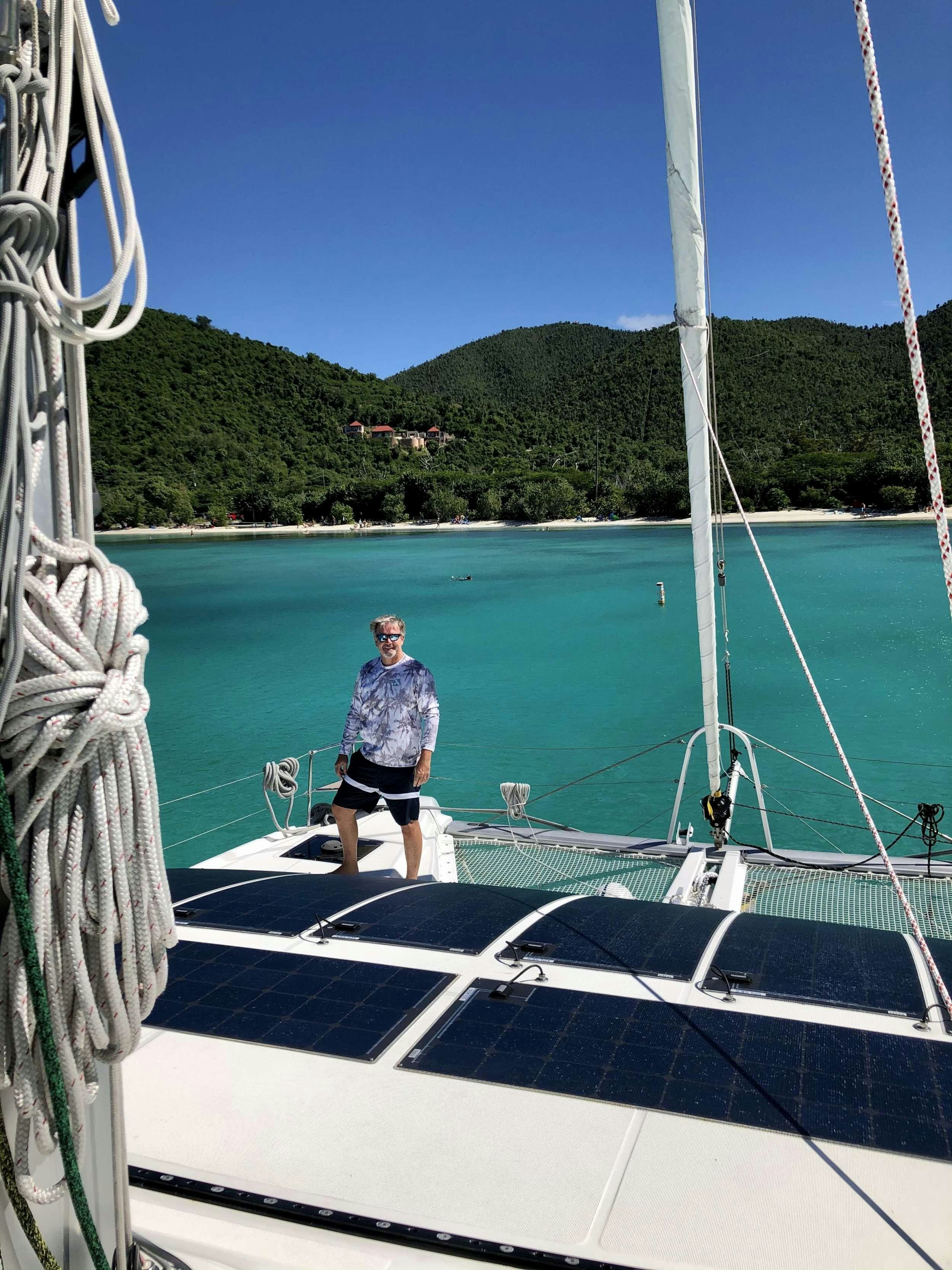 a person sitting on a boat aboard SEA IO Yacht for Charter