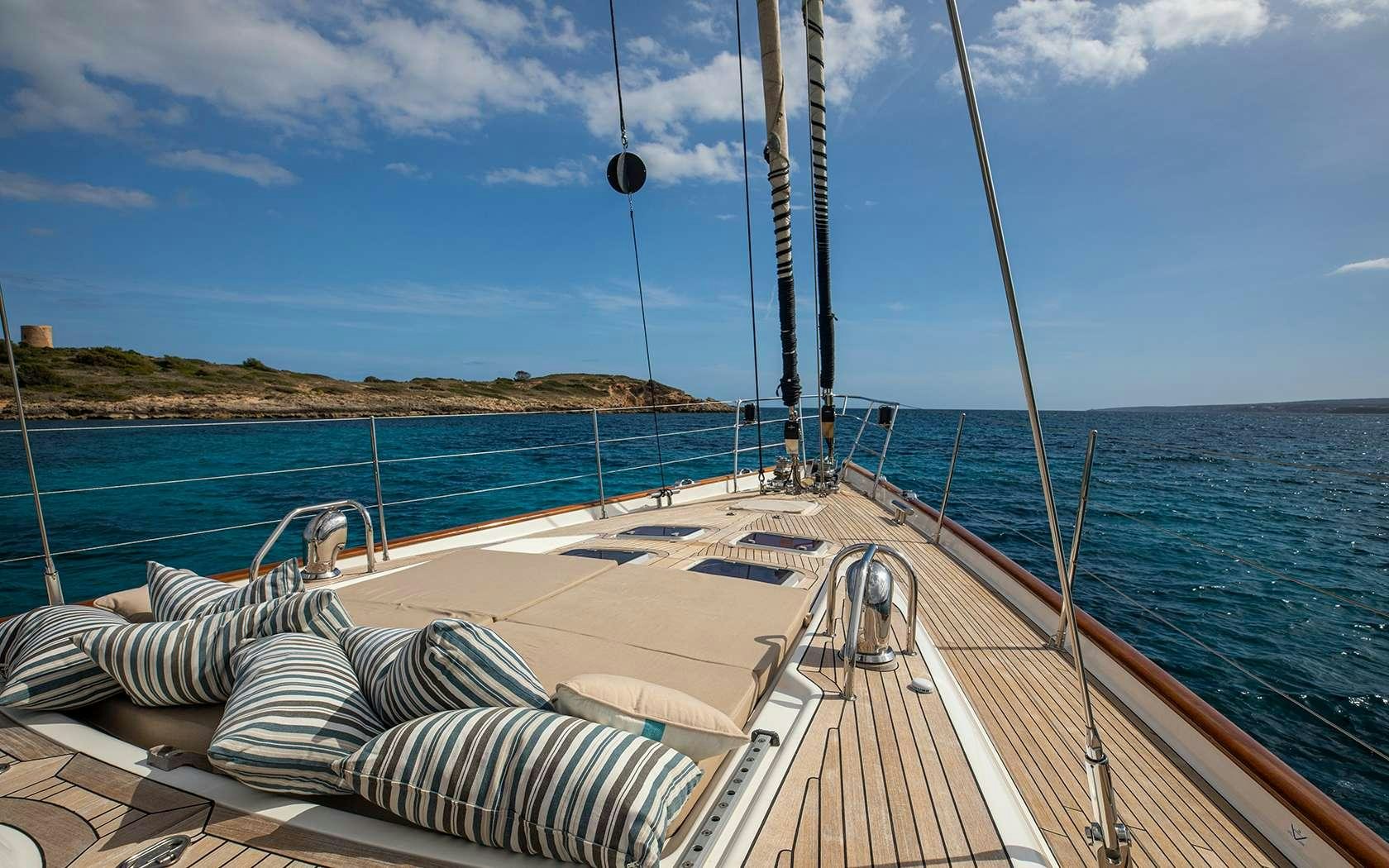a boat on the water aboard BARE NECESSITIES Yacht for Charter