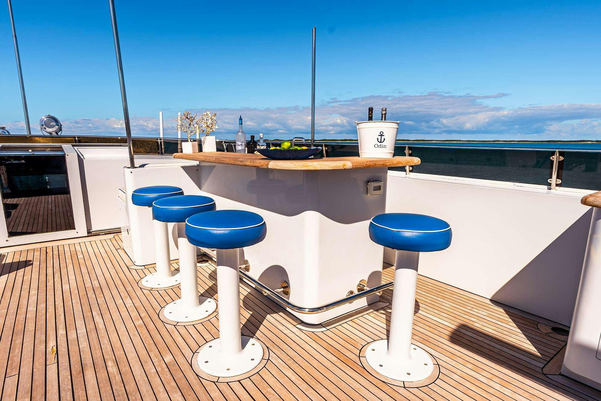 a large kitchen with a view of the ocean aboard ODIN Yacht for Charter