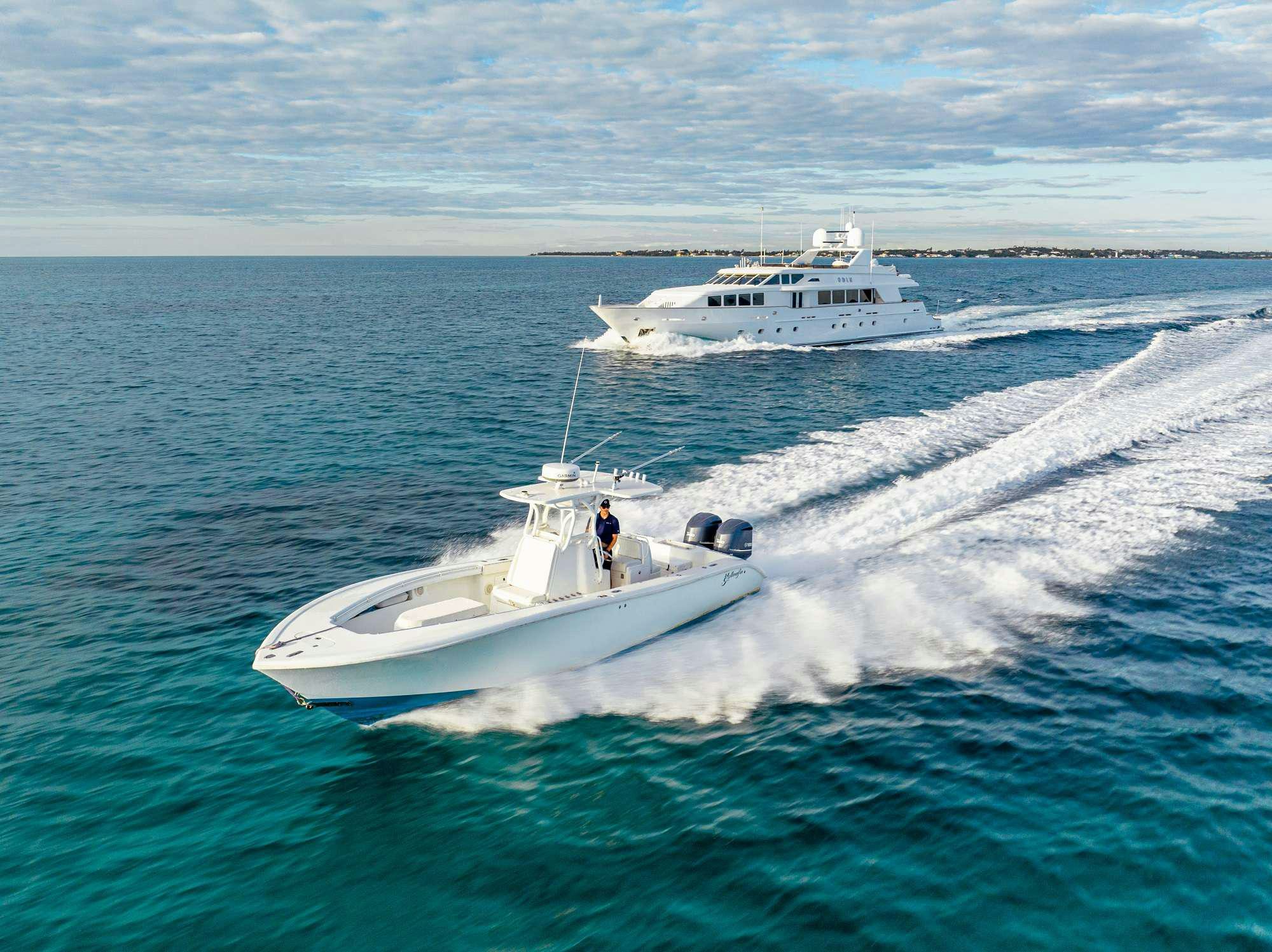 a boat with a person on it aboard ODIN Yacht for Charter